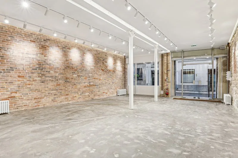 Brick and Stone Space with Glass Roof on Rue du Sentier — 5