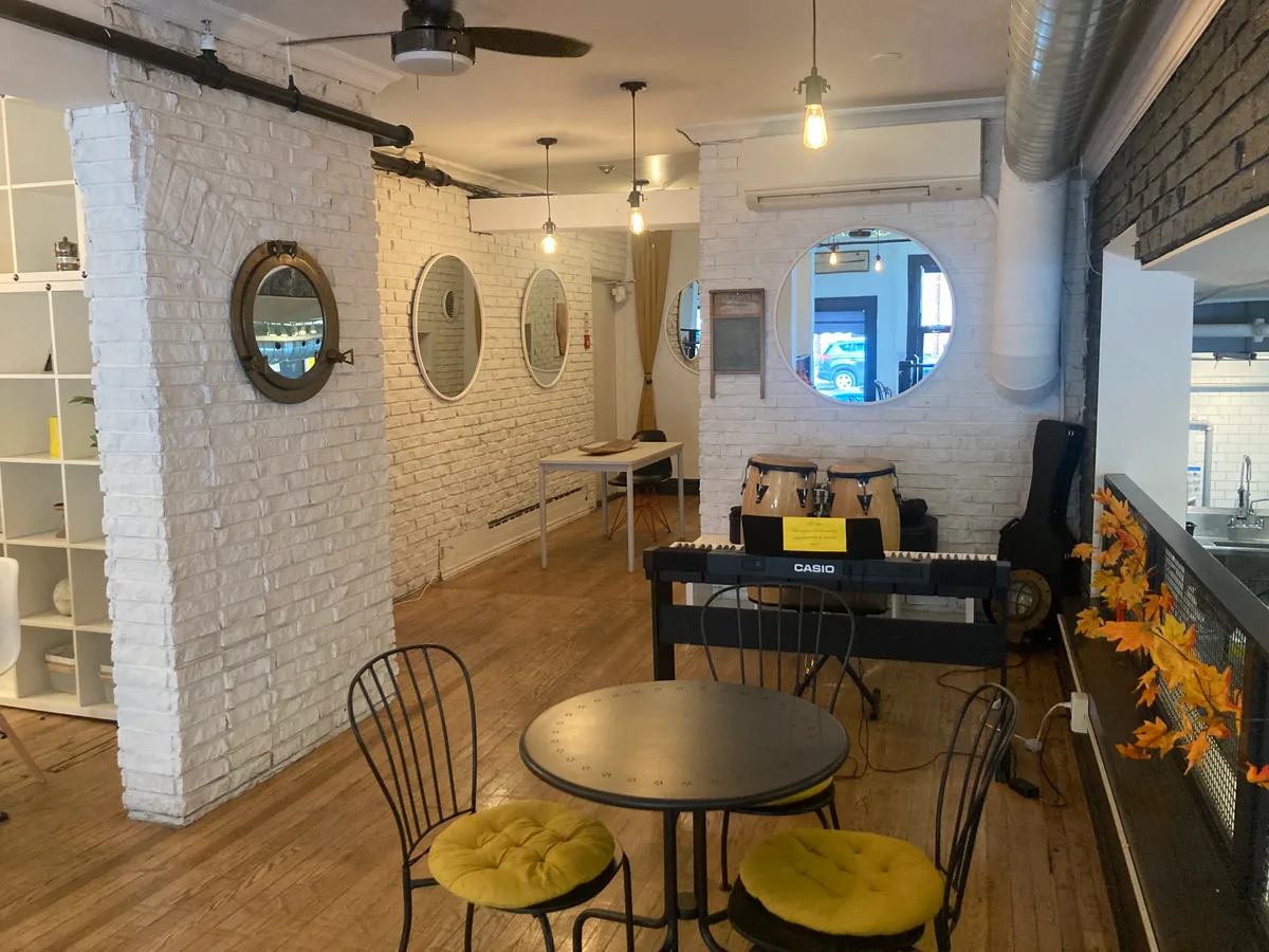 Mezzanine Event Space in Roncy’s New Cafe, 65 sqm, showroom presentation, pop-up rental in Toronto