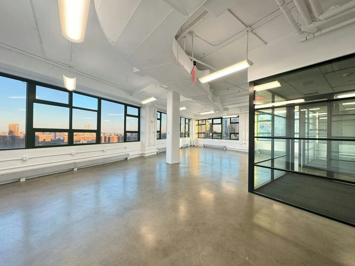 Sleek Industrial Event Space with Skyline Views in DUMBO