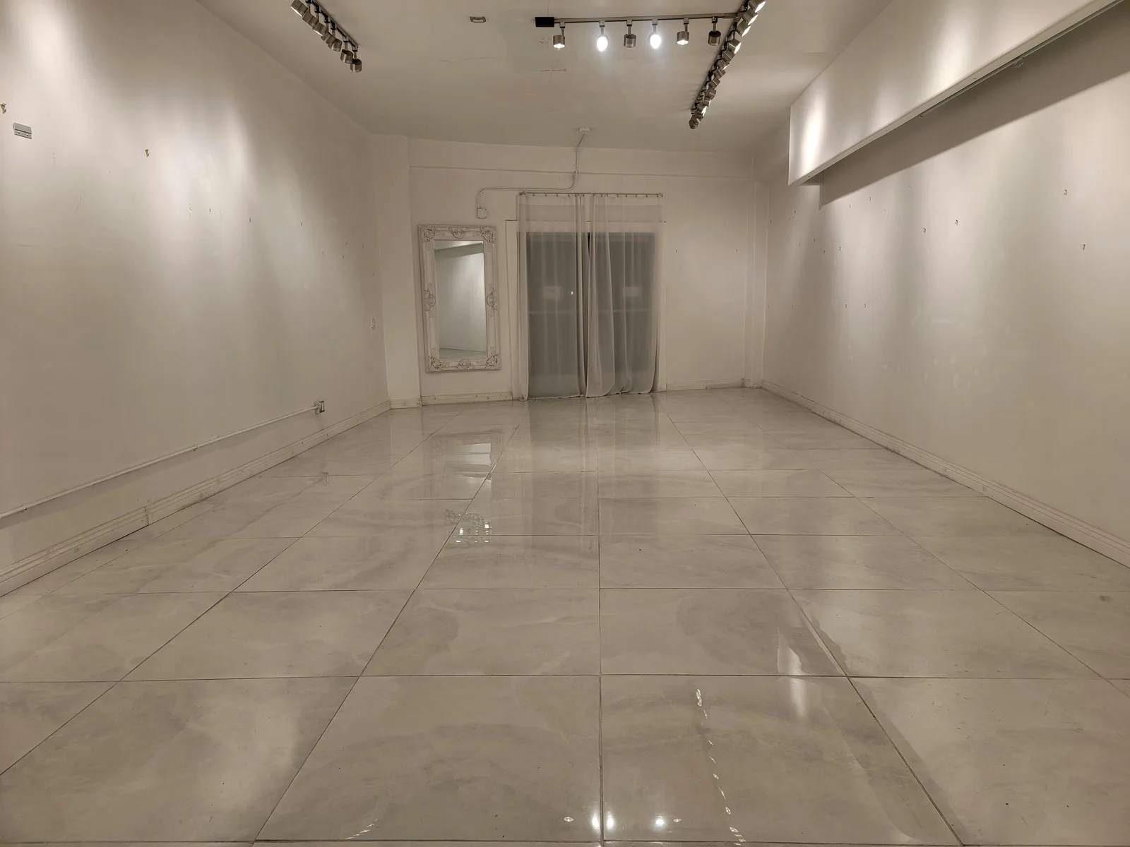 Stunning All White Marbled Gallery in Los Angeles — 5